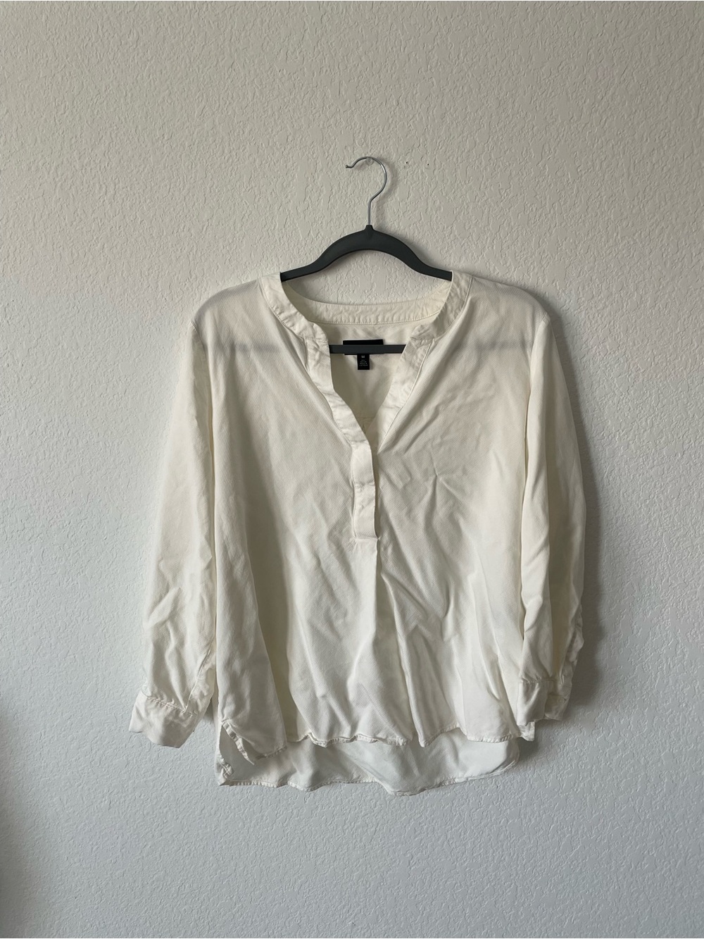 Investments Cream Split-Neck Ruffle Hem Blouse